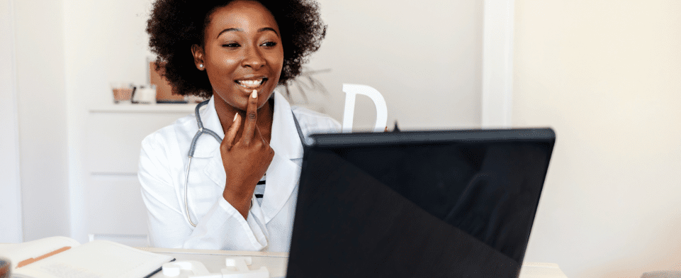 Speech therapist working with adult patient over telemedicine
